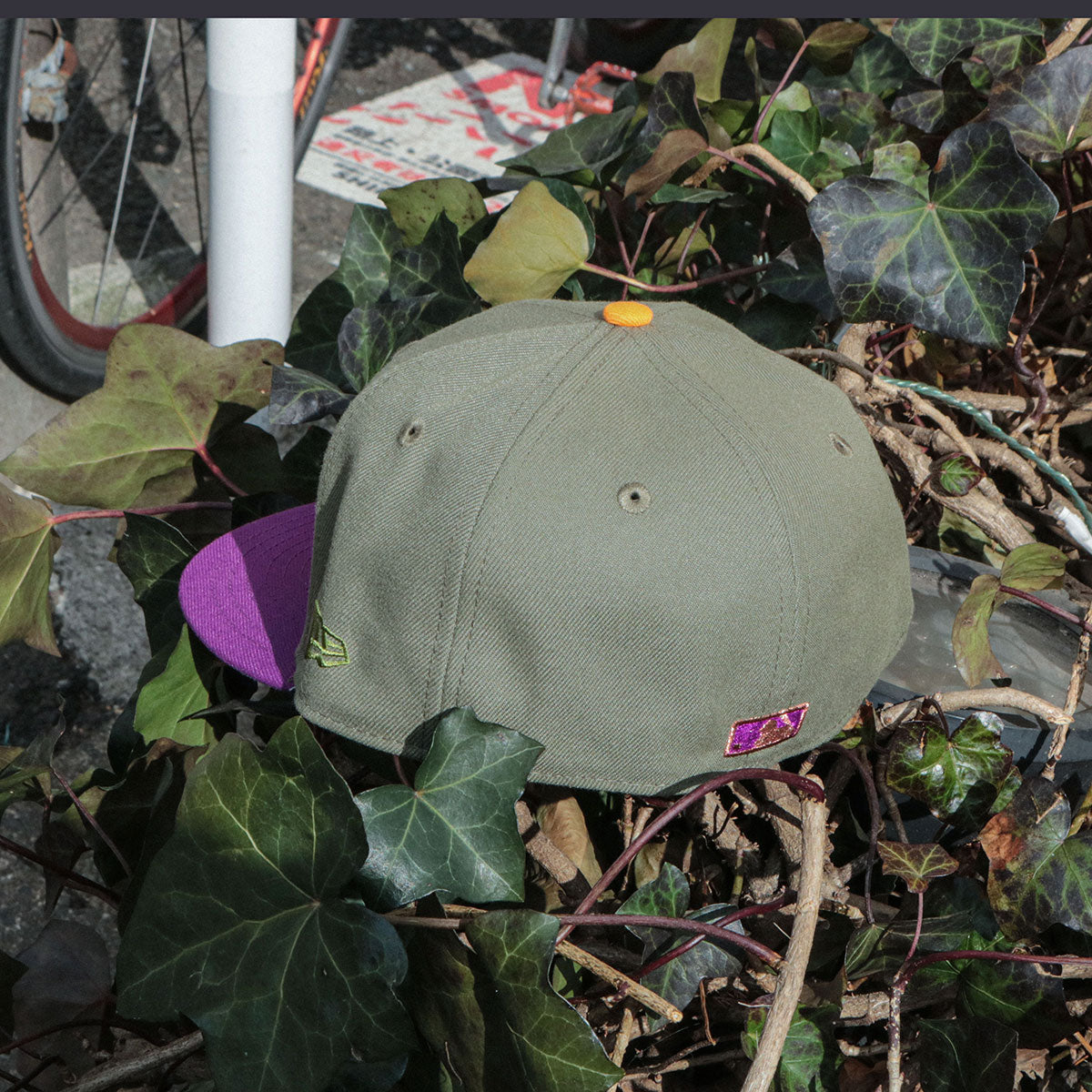 NEW ERA CLEVELAND GUARDIANS - 59FIFTY CO PROGRESSIVE FIELD OLIVE/PURPLE