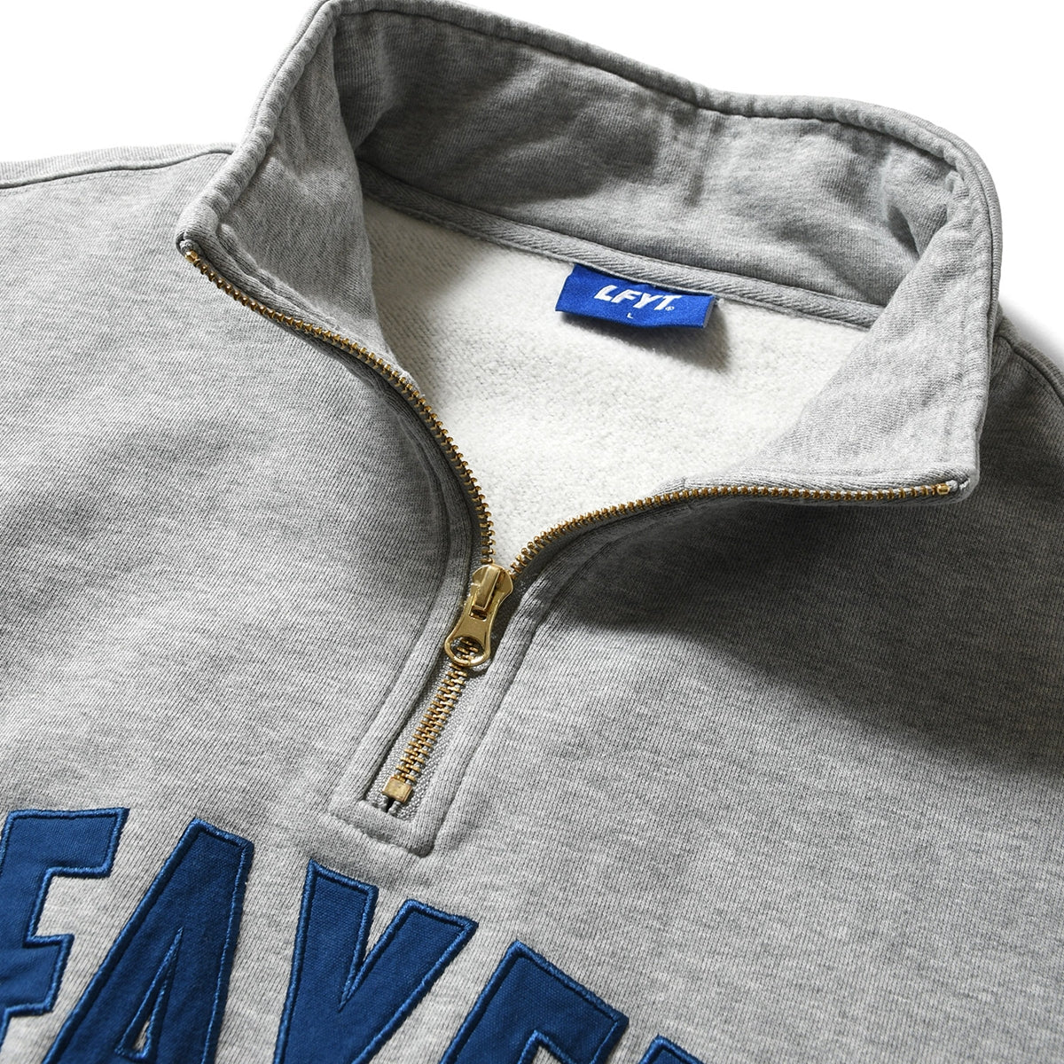 LA250702 ARCH LOGO HALFZIP SWEATSHIRT