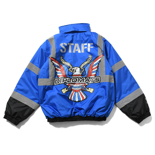 JOMO GLOBAL｜The Dipromats - High-Visibility Jacket Blue