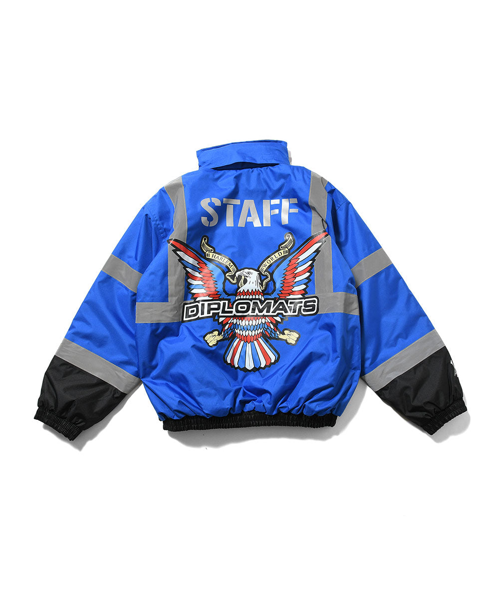 JOMO GLOBAL｜The Dipromats - High-Visibility Jacket Blue