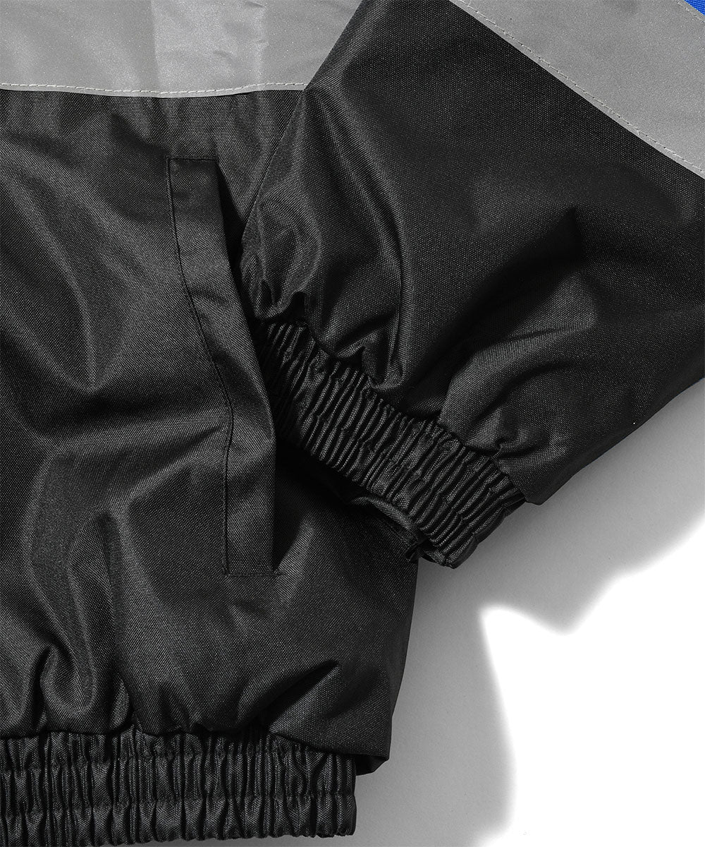 JOMO GLOBAL｜The Dipromats - High-Visibility Jacket Blue