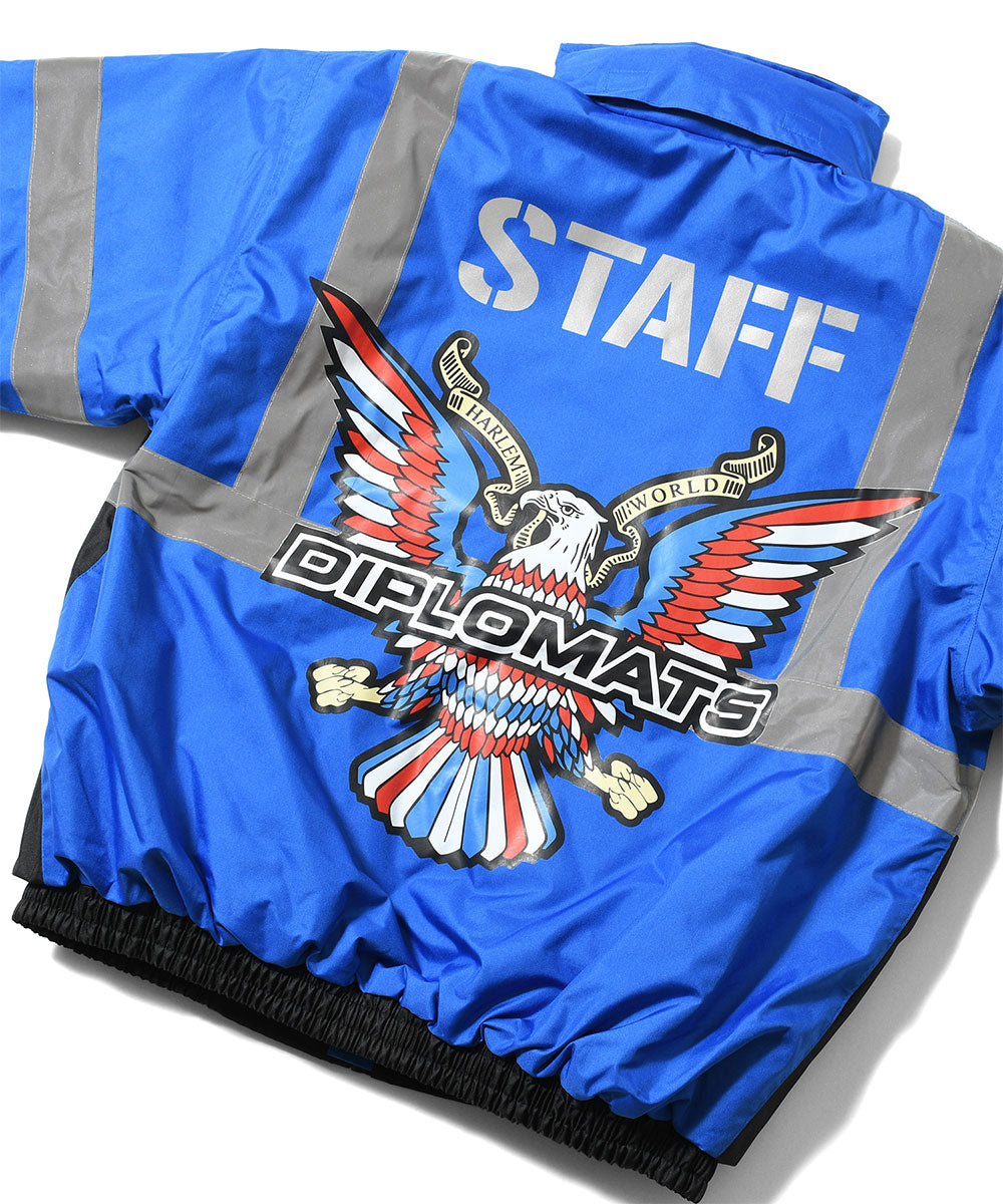 JOMO GLOBAL｜The Dipromats - High-Visibility Jacket Blue